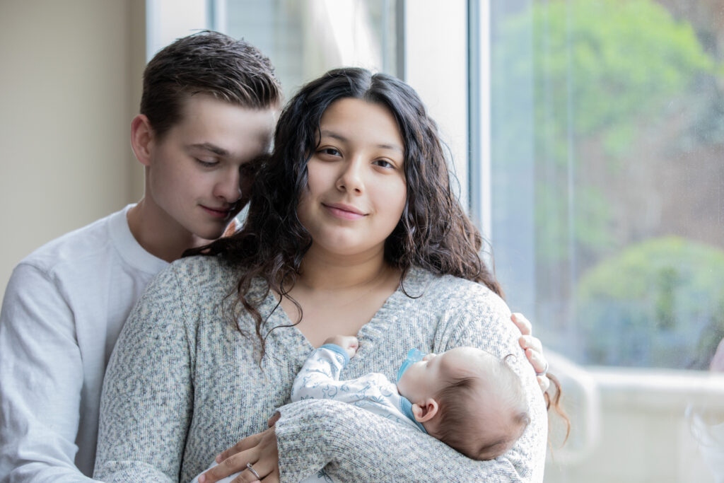 Young Parents with Newborn baby at hospital